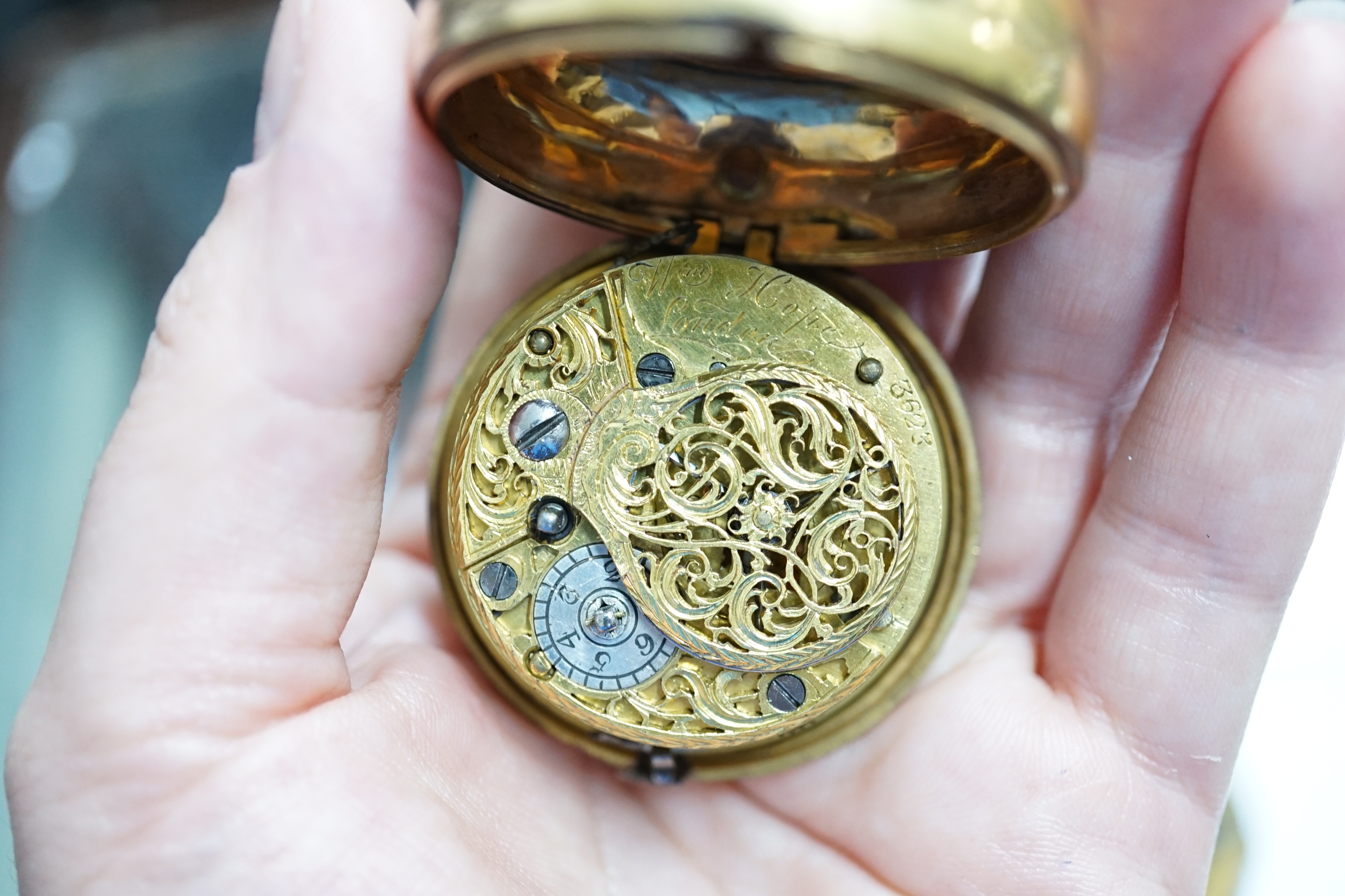 A George III pair cased gold plated pocket watch, with a green stained tortoiseshell outer case, by William Hope, London